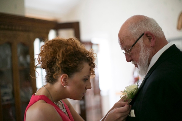 father of the bride getting ready